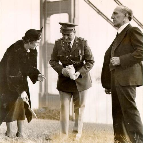 [Mrs. E. B. McCarthy, Captain George Dietz and Dr. Frederick Stapff planting poppies in preparation for the 1939 Golden Gate International Exposition]
