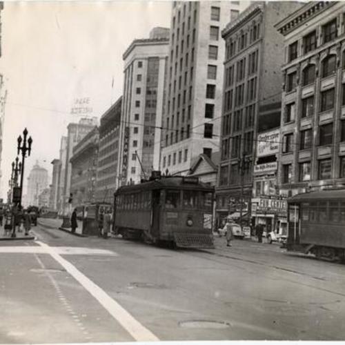 [Streetcars disobeying traffic signals at Market Street and Grant Avenue]
