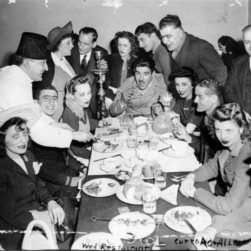 [Going away party for an unidentified soldier at the Nile Cafe]