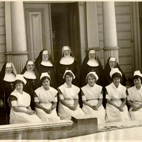 [Group of nuns and nurses at St. Joseph's Hospital]
