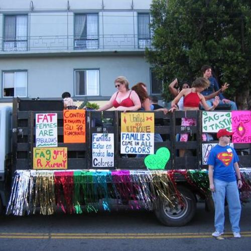 [A float with signs and women on Pink Saturday Dyke March in 2004 on Guerrero Street]
