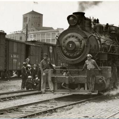 [Belt Line Railroad train arriving at the waterfront during longshoremen's strike of 1934]