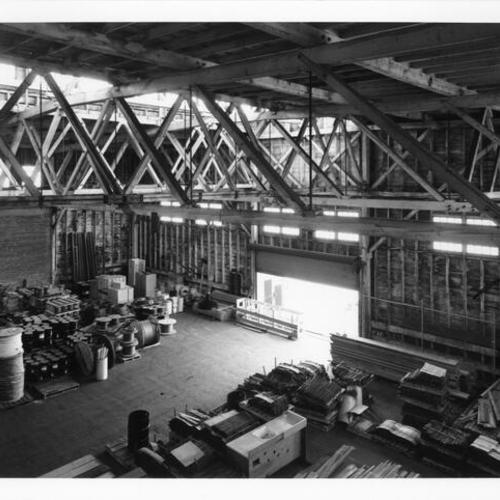 [Interior view of the east wall of Pier 16 shed]