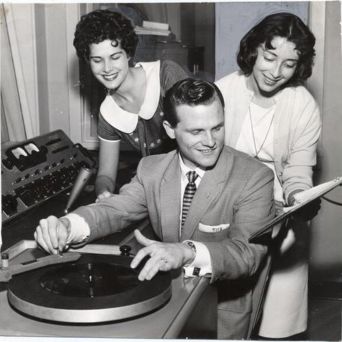 [Carol Falberg, Jack Sampson and Anne Osorno in a broadcast booth at San Francisco State College]