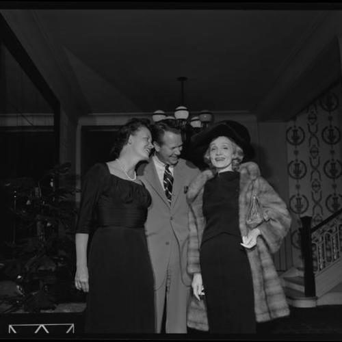 Marlene Dietrich at cocktail party by H. R. Basford Co. and Columbia Records Distribution