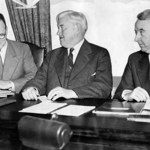 [Chief Administrative Officer Thomas Brooks (right) with U.S. Senator Rufus C. Holman  (center) and George Malone (left)]