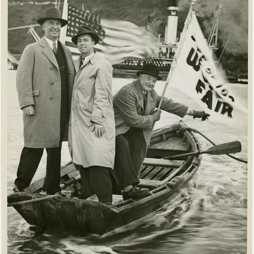 [George D. Smith, W. Kent Dyson, and Leland W. Cutler standing in rowboat]
