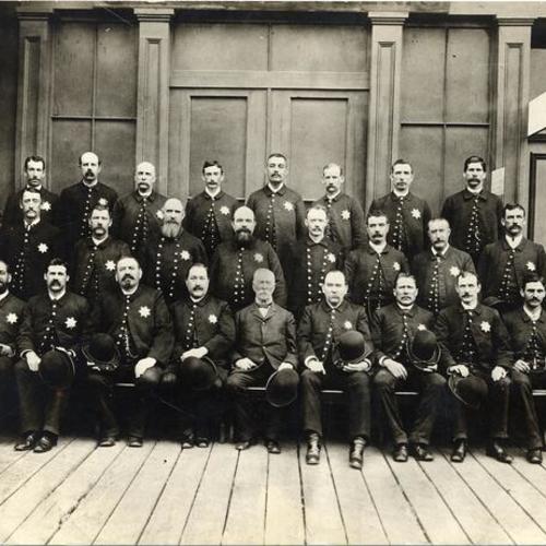 [Group photo of police officers at Folsom Street Police Station]