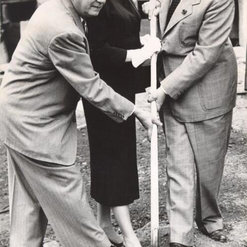 [Mr. and Mrs. Herbert Goodwin and Acting Mayor Byron Arnold at the ground breaking ceremony for Hamm's Brewery on Bryant Street]