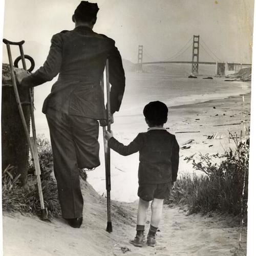 [Wounded World War II veteran with his son]