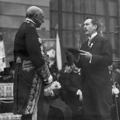 [President C.C. Moore presenting medal to former Mayor of Rome, Ernesto Nathan]