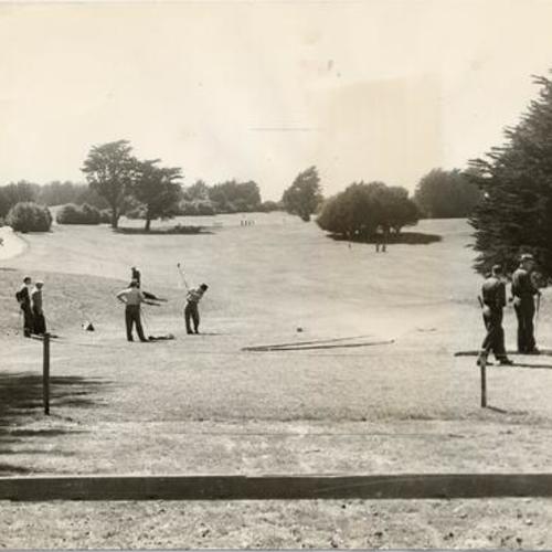 [Golfers at Lincoln Park Golf Course]