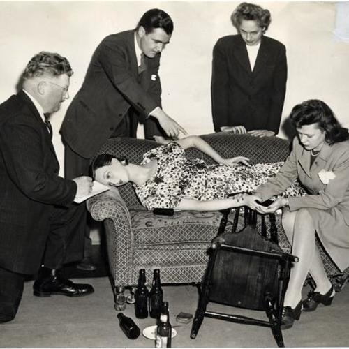 [Law enforcement officers, J.D. Corby, A.T. Potter, Barbara Hall, and Lina Brown, investigating a simulated crime at the FBI's fingerprint school]
