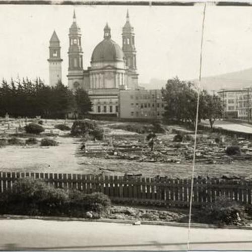 [View of Masonic Cemetery with St. Ignatius Church in background]