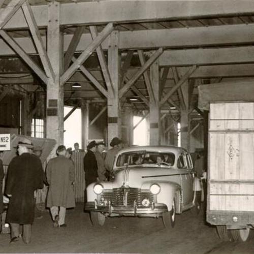 [Passengers getting ready to board a ship at Pier 44]