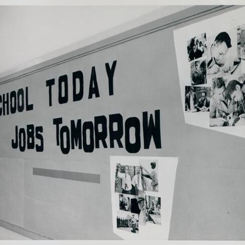 [Wall display reading "School Today, Jobs Tomorrow" at Pelton Junior High School]