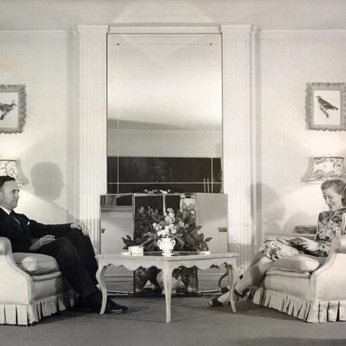 [John and Ruth Bernet in their living room at 2123 Jackson Street]