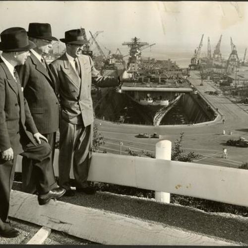 [William Pengra pointing out sights of the San Francisco Naval Shipyard]