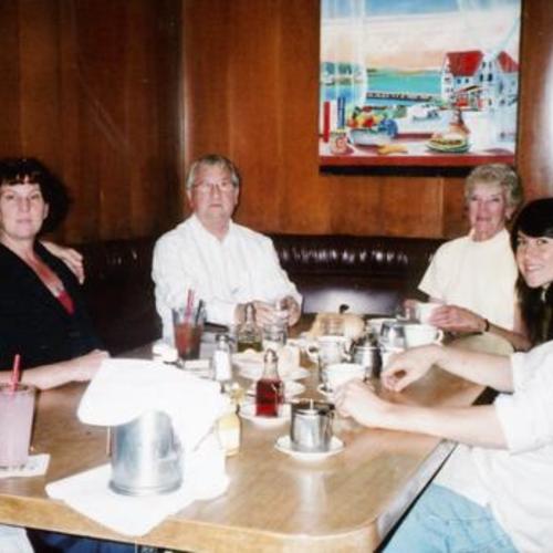 [Sotcha and his family having dinner at Original Joe's]