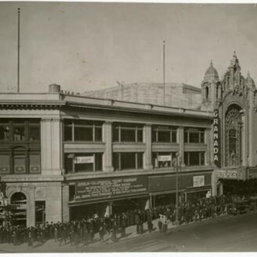 [Crowd outside the Granada Theater at Market and Jones Streets]