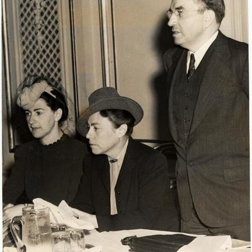 [Hyman Kaplan (right) with Mrs. Pearl L. Axelrod and Nellie Woodward at Conference on Juvenile deliquency]