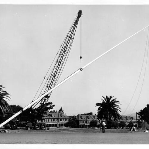 [New flagpole being erected at the Presidio]