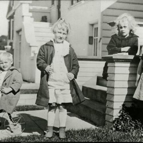 [Bill, sister Dorothy and cousin Charlotte with friend on 21st Avenue in 1917]