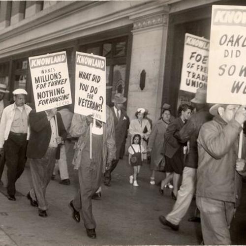 [Pickets protesting outside the Palace Hotel where Senator William Knowland is addressing the Commonwealth Club]