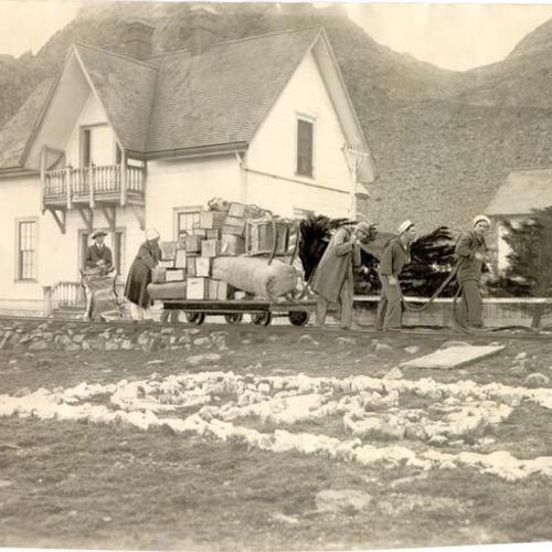 [Supplies being transported on a railroad track on an island in the Farallones]