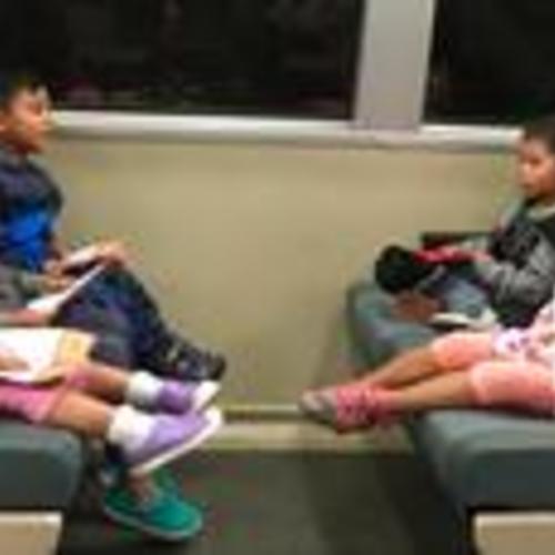 [Siblings, Jesela and Keanae, family friends riding BART for the first time on the way to Chinatown]