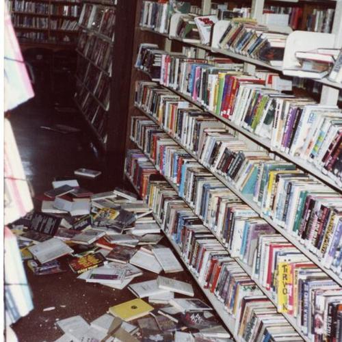 Mission Branch Library, books on ground, n.d., 1 of 3