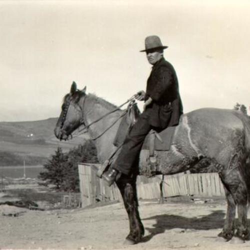[Unidentified man on horseback in Visitacion Valley]
