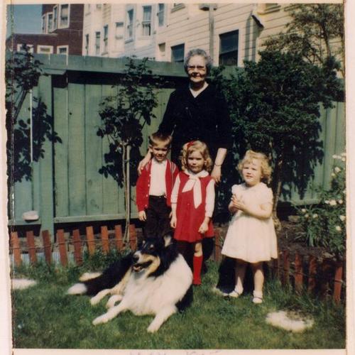 [Pamela with her sister, brother, grandmother Edna and family dog Valiant]
