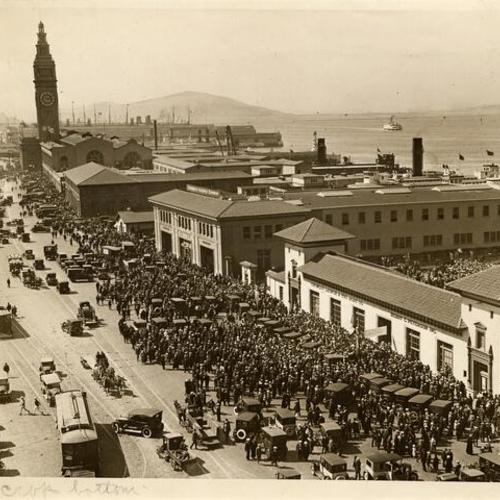 [Crowd of people on the Embarcadero, near the Ferry Building]