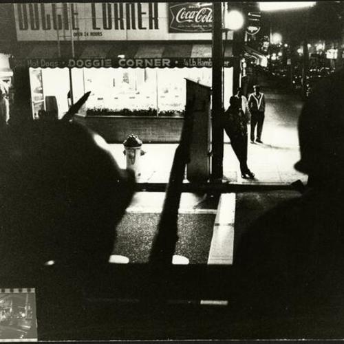 [Fillmore Street at night during the curfew caused by the 1966 Bayview-Hunters Point riots]