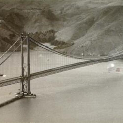 [Aerial view of the Golden Gate Bridge while still under construction]