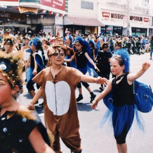 [Children dressed up in costumes from Buena Vista School for Carnival and parade on Mission Street]