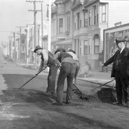 [Men working on Church Street]
