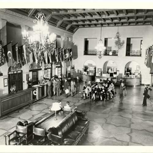 [Passengers in the San Francisco airport's baroque lobby during pre-war 1940-41]