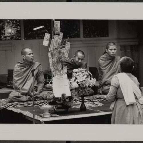 Cambodian monks with money tree for fundraiser to rebuild temple in war-torn Cambodia at Cadillac Hotel