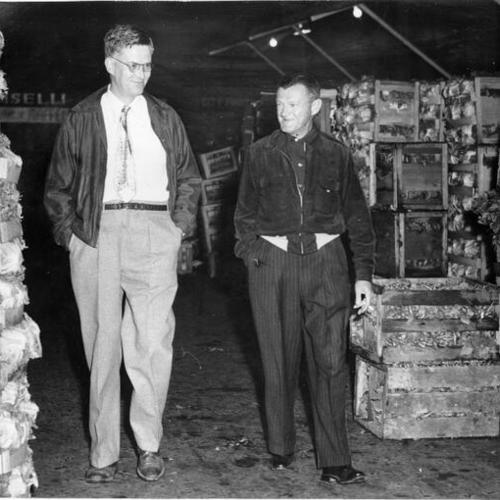 [Health Director Ellis D. Sox and A. B. Crowley, his chief inspector, on a surprise inspection of produce markets]