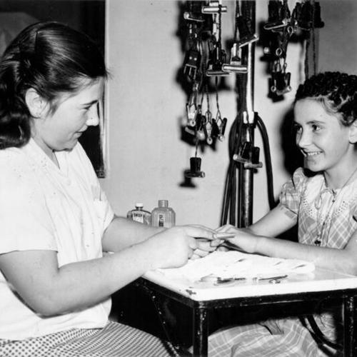 [Two girls in a class at the Home of the Good Shepherd]