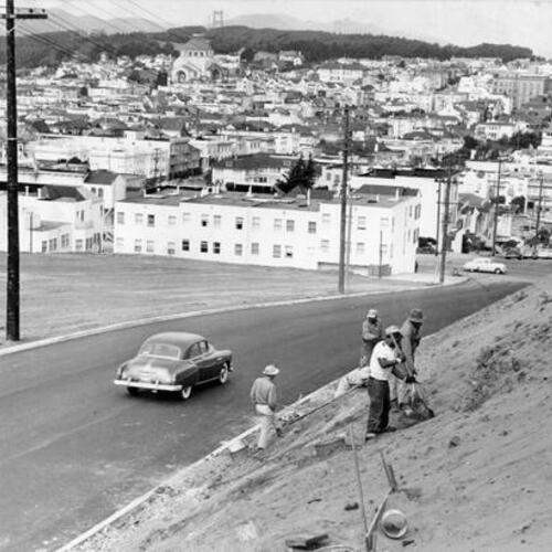 [Men working on hill next to Parker Avenue]