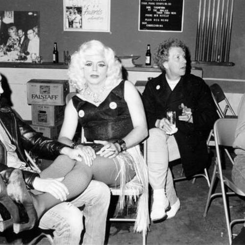 [Female impersonator and other patrons inside the 527 Club]