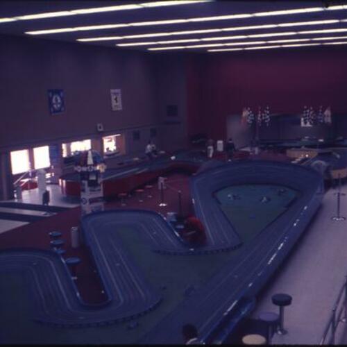 [Miniature slot car racetrack on Great Highway in former Playland at the Beach's "Topsy's Roost" building]