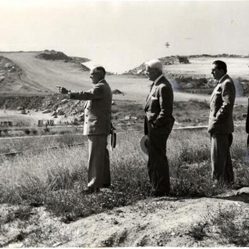 [Thomas A. Maloney, Thomas J. Mellon, John J. Gould, Sherman B. Duckel and E. Elmore Hutchinson during an inspection of Hunters Point]