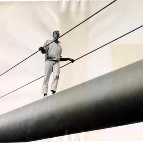[Billy Crosby standing on a supporting cable on the Golden Gate Bridge during a suicide attempt]