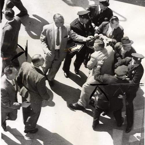 [Jerry Kamstra being dragged out by police]