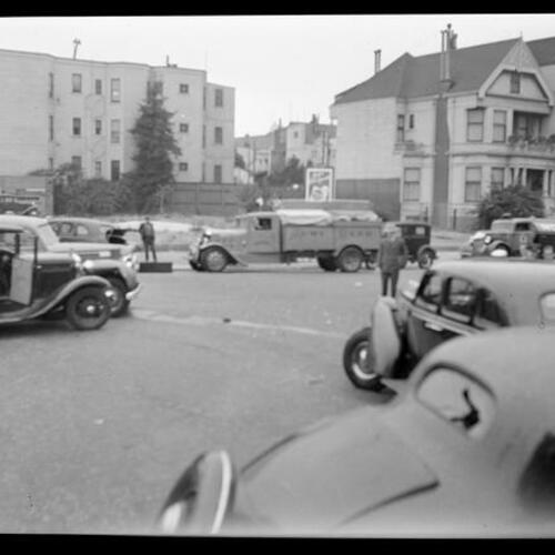 [Automobile accident at the intersection of Baker and Grove Streets]