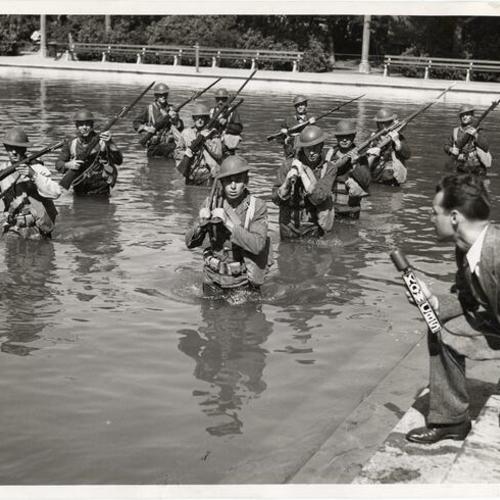 [Fleishhacker Pool, military demonstrating stream-fording tactics, June 11, 1942]